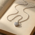 Detailed sparkle heart styling on the Silvme Sparkle Heart Pendant Necklace in polished 925 sterling silver