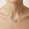 Double Heart design detail on the Silvme Double Heart Pendant Necklace, crafted in polished 925 silver