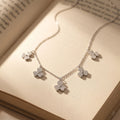 Multi Clover design detail on the Silvme Multi Clover Pendant Necklace, crafted in polished 925 silver