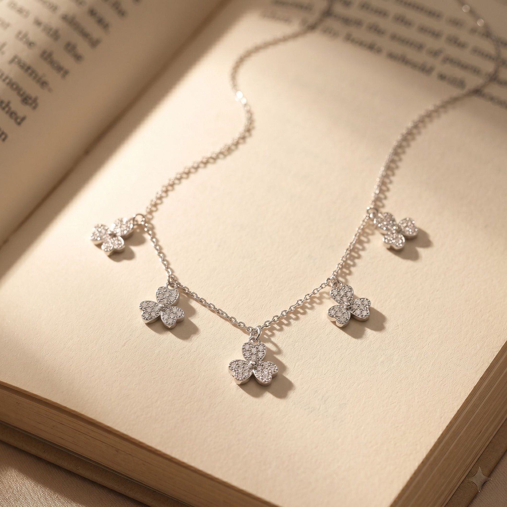 Multi Clover design detail on the Silvme Multi Clover Pendant Necklace, crafted in polished 925 silver