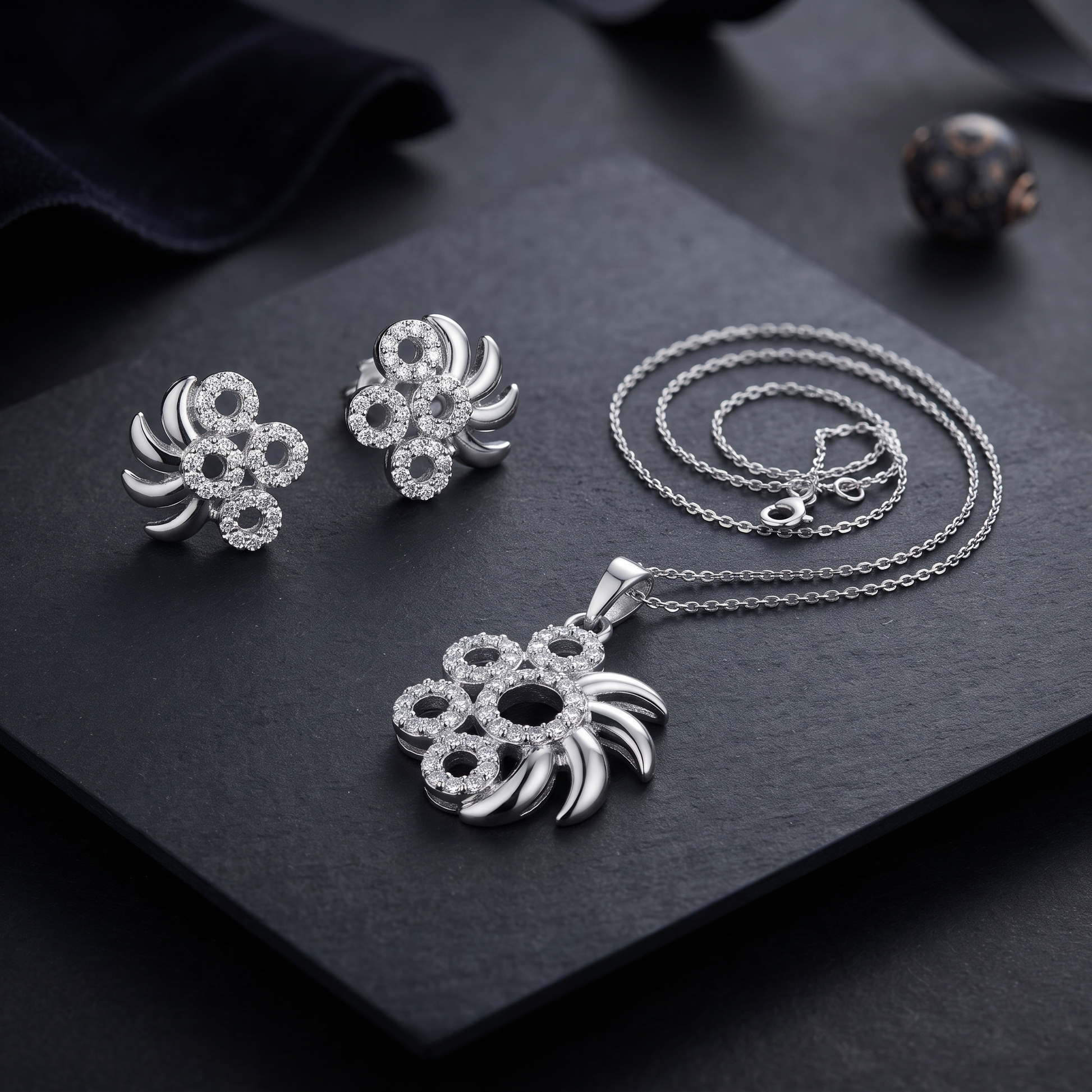 Silvme 925 silver pinwheel pendant and stud earrings with cubic zirconia, model styling view