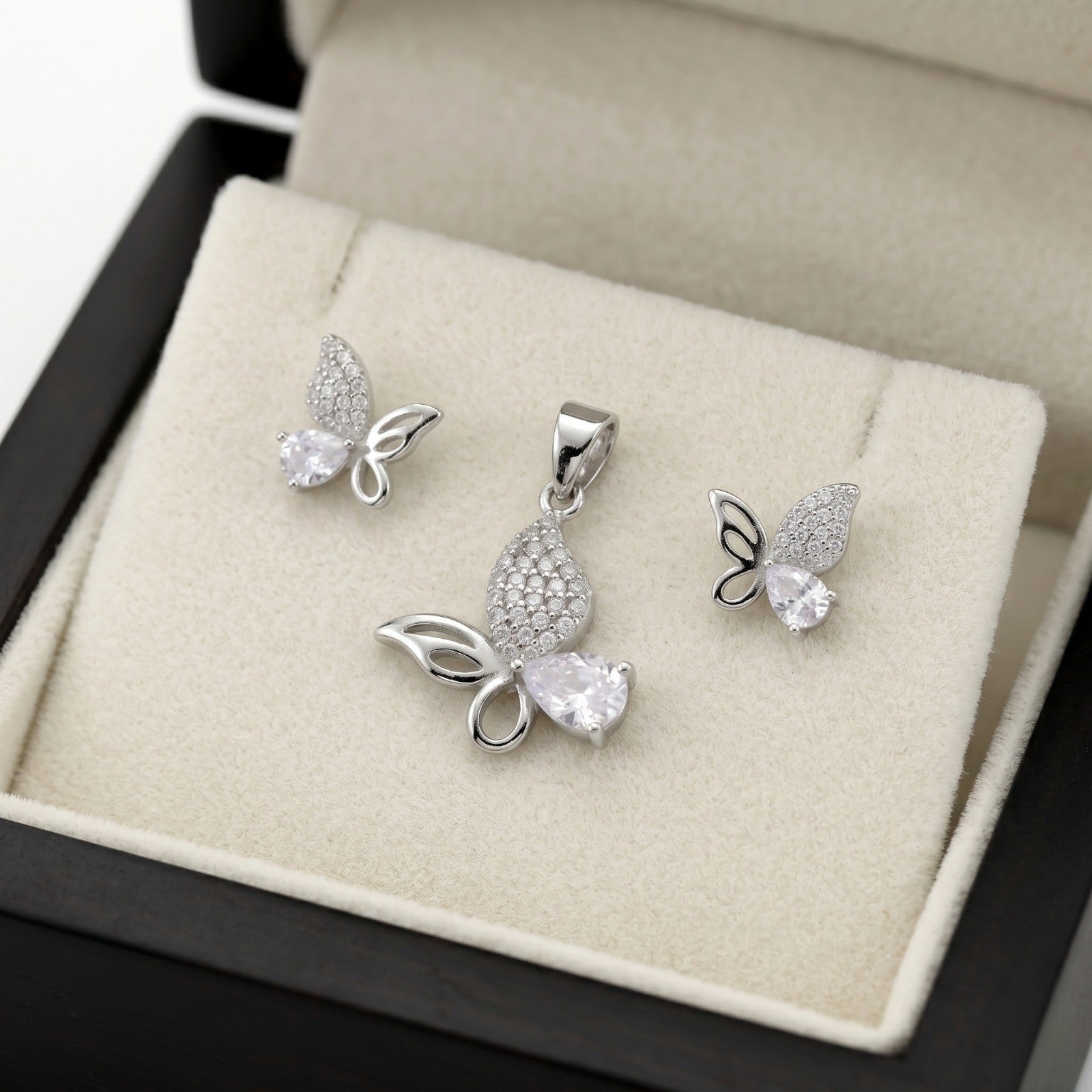 Pink Butterfly 925 sterling silver pendant and stud earrings jewellery set with pink cubic zirconia by Silvme â€” pendant close-up