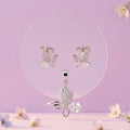 Pink Butterfly 925 sterling silver pendant and stud earrings jewellery set with pink cubic zirconia by Silvme â€” angled studio view