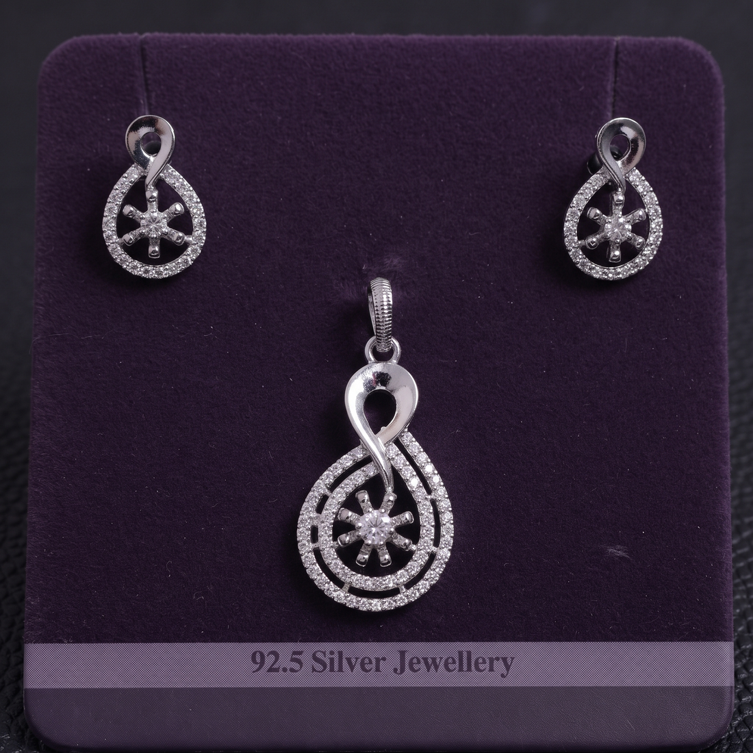 Silvme pure 925 sterling silver cubic zirconia pendant and stud earrings set with cubic zirconia, styled product image
