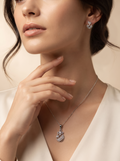 Silvme 925 silver floral drop pendant and drop earrings with cubic zirconia, styled product image