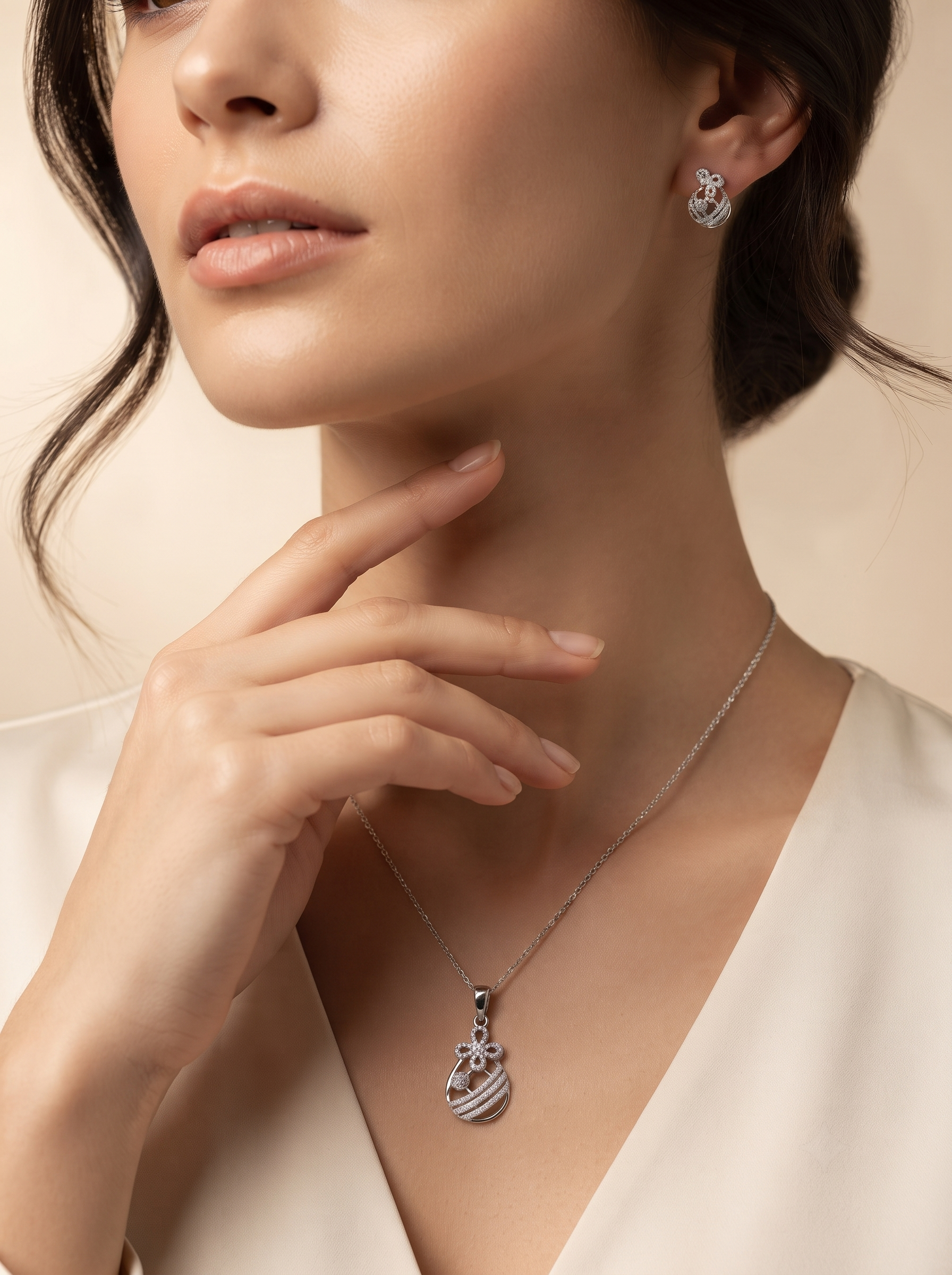 Silvme 925 silver floral drop pendant and drop earrings with cubic zirconia, styled product image