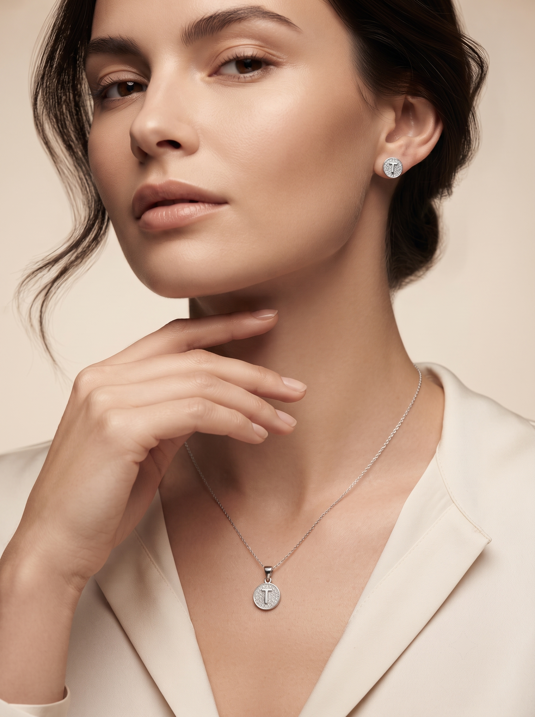 Initial T 925 sterling silver pendant necklace and stud earrings jewellery set with cubic zirconia by Silvme â€” styled lifestyle image