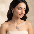 Pinwheel 925 sterling silver pendant and stud earrings jewellery set with cubic zirconia by Silvme â€” styled lifestyle image