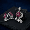 Red Floral 925 sterling silver pendant and drop earrings jewellery set with red cubic zirconia by Silvme â€” pendant close-up