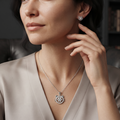 Cat face stud earring worn close to the ear with a neutral outfit