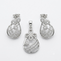 Silvme pure 925 sterling silver floral drop pendant and drop earrings set with cubic zirconia, front view on white background