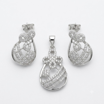 Silvme pure 925 sterling silver floral drop pendant and drop earrings set with cubic zirconia, front view on white background