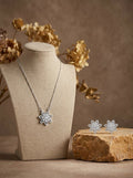 Silvme pure 925 sterling silver floral flower pendant necklace and stud earrings set with cubic zirconia, detail sparkle close-up