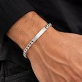 Link pattern and surface detail across the curb chain id bracelet by Silvme