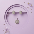 Silvme pure 925 sterling silver starburst medallion pendant and stud earrings set with cubic zirconia, side profile view