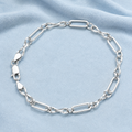 Close-up of long flat links alternating with short ovals for a relaxed, uneven cadence on the Silvme long and short link brac
