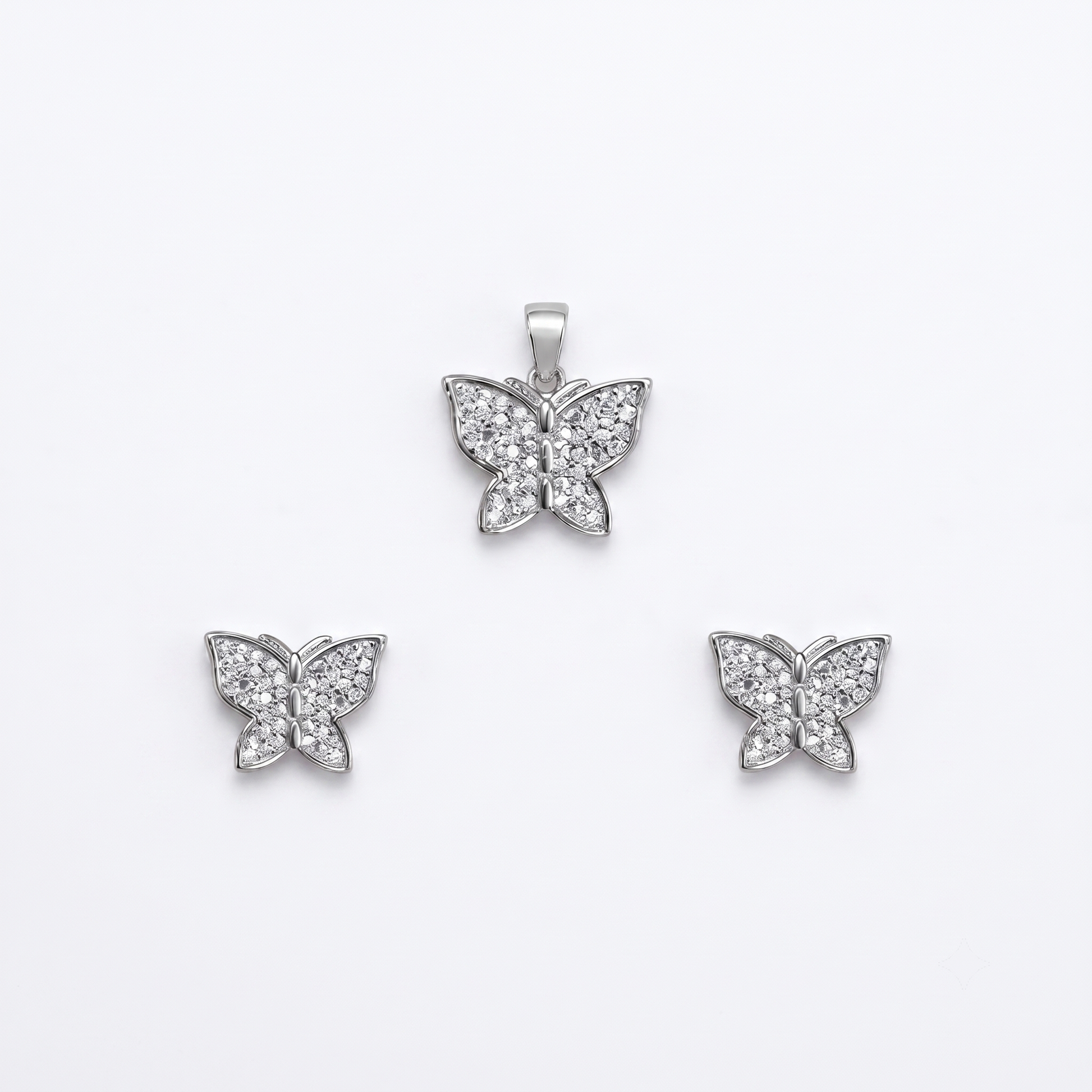 Silvme pure 925 sterling silver butterfly pendant and stud earrings set with cubic zirconia, front view on white background