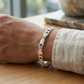 Link pattern and surface detail across the wide curb chain bracelet by Silvme