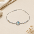Charm, bead and chain detail on the Silvme CZ evil eye floral 925 silver anklet payal