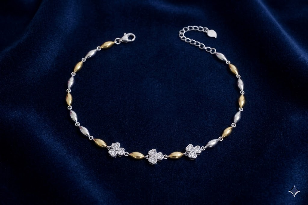 925 sterling silver Two-Tone Floral CZ Bracelet by Silvme accented with sparkling cubic zirconia, gold-tone finish, an elegant accessory for her