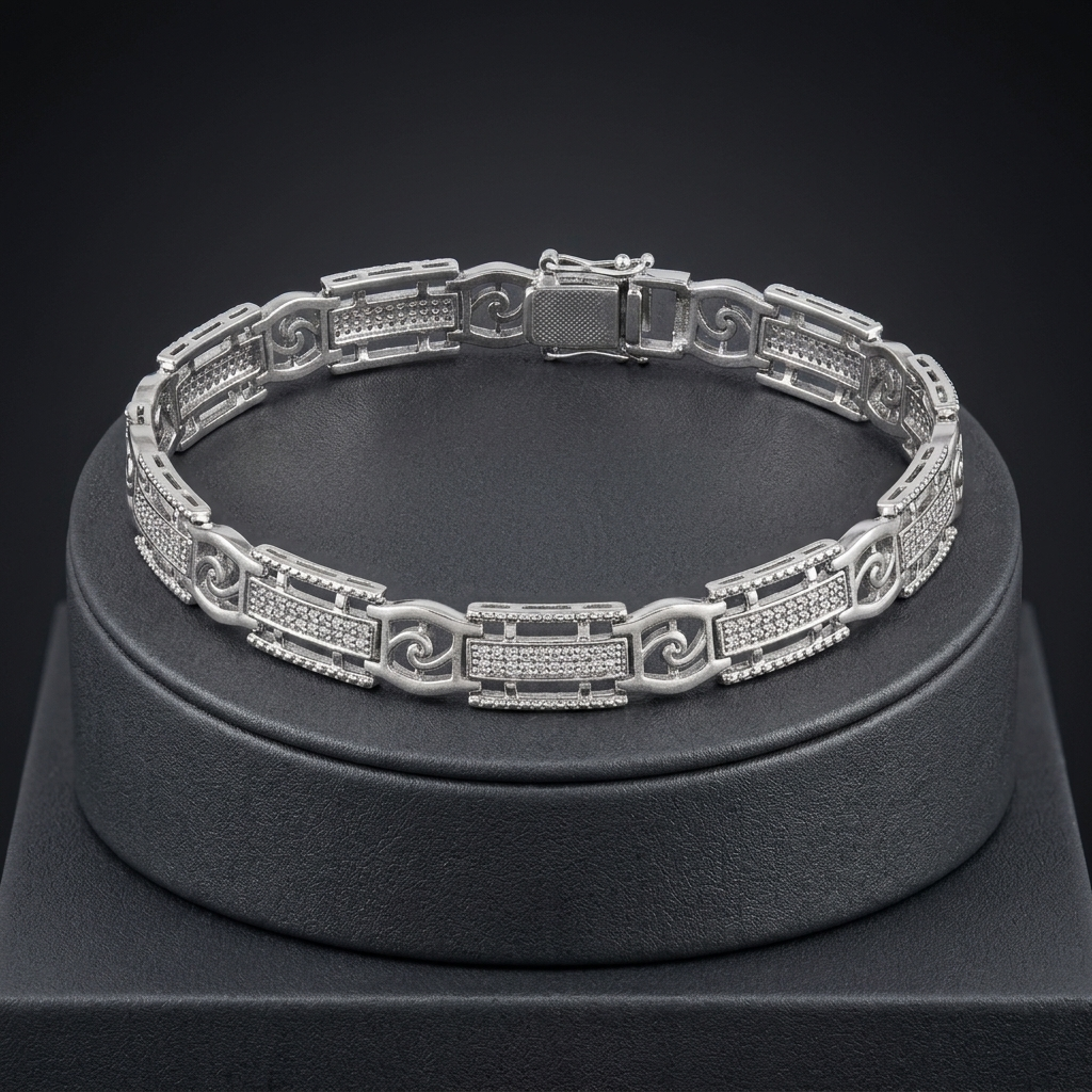 Full length of the slim textured link bracelet showing its polished silver-tone finish