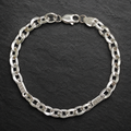 Link pattern and surface detail across the greek key mariner bracelet by Silvme