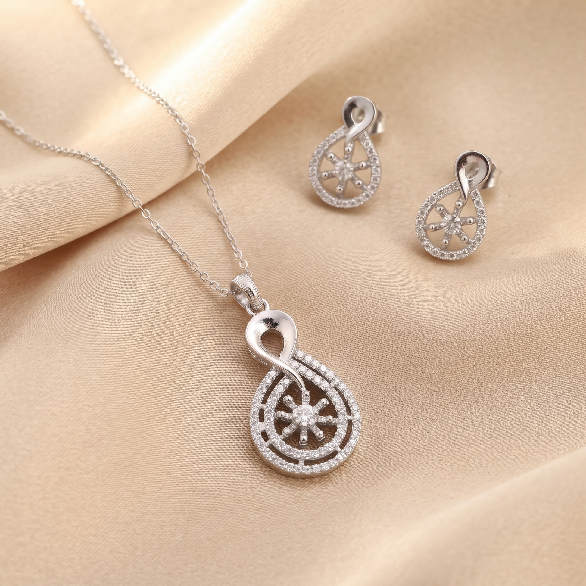 Cubic Zirconia 925 sterling silver pendant and stud earrings jewellery set with cubic zirconia by Silvme â€” styled lifestyle image