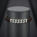 Full length of the braided cord bracelet with pave bar showing its brown cord with silver-tone fittings finish