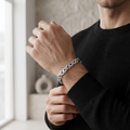 End links and fastening detail on the Silvme open arc link bracelet