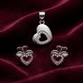 Open Heart 925 sterling silver pendant and stud earrings jewellery set with cubic zirconia by Silvme â€” angled studio view