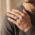 Silvme sunburst turtle silver ring for women worn stacked with plain silver bands on the hand