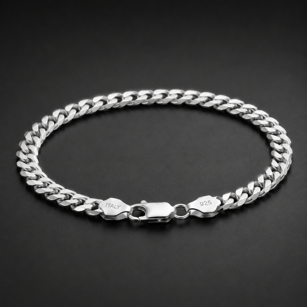 Silvme 925 sterling silver heavy curb chain bracelet for men on a dark studio surface