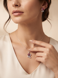 Silvme pure 925 sterling silver red floral pendant and drop earrings set with red cubic zirconia, styled lifestyle image