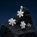 Silvme pure 925 sterling silver snowflake pendant and stud earrings set with cubic zirconia, side profile view