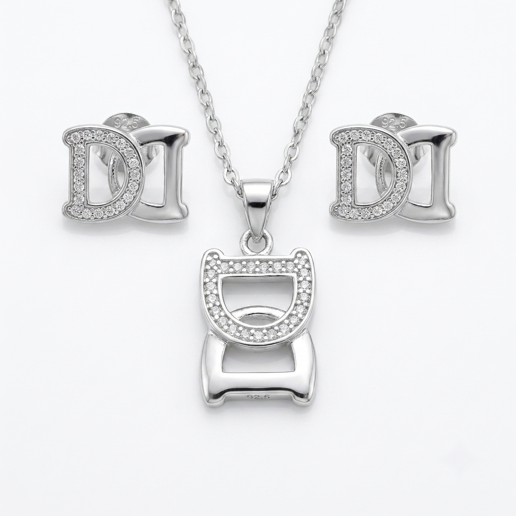 Silvme pure 925 sterling silver initial d pendant necklace and stud earrings set with cubic zirconia, front view on white background