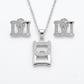 Silvme pure 925 sterling silver initial d pendant necklace and stud earrings set with cubic zirconia, front view on white background