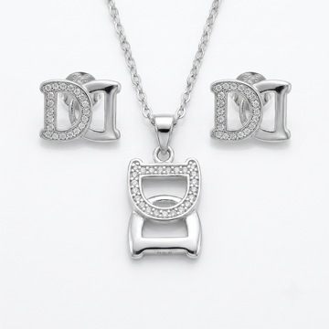 Silvme pure 925 sterling silver initial d pendant necklace and stud earrings set with cubic zirconia, front view on white background