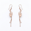 Rose Gold Floating Star Dangle Earrings, front product view