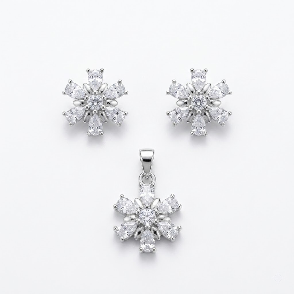 Silvme pure 925 sterling silver snowflake pendant and stud earrings set with cubic zirconia, front view on white background