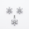 Silvme pure 925 sterling silver snowflake pendant and stud earrings set with cubic zirconia, front view on white background