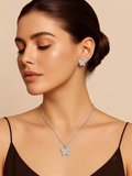 Silvme pure 925 sterling silver butterfly pendant and stud earrings set with cubic zirconia, styled lifestyle image