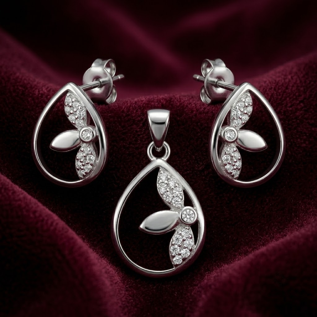 Teardrop 925 sterling silver pendant and drop earrings jewellery set with cubic zirconia by Silvme â€” pendant close-up