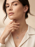 Ribbon Bow 925 sterling silver pendant and stud earrings jewellery set with cubic zirconia by Silvme â€” styled lifestyle image
