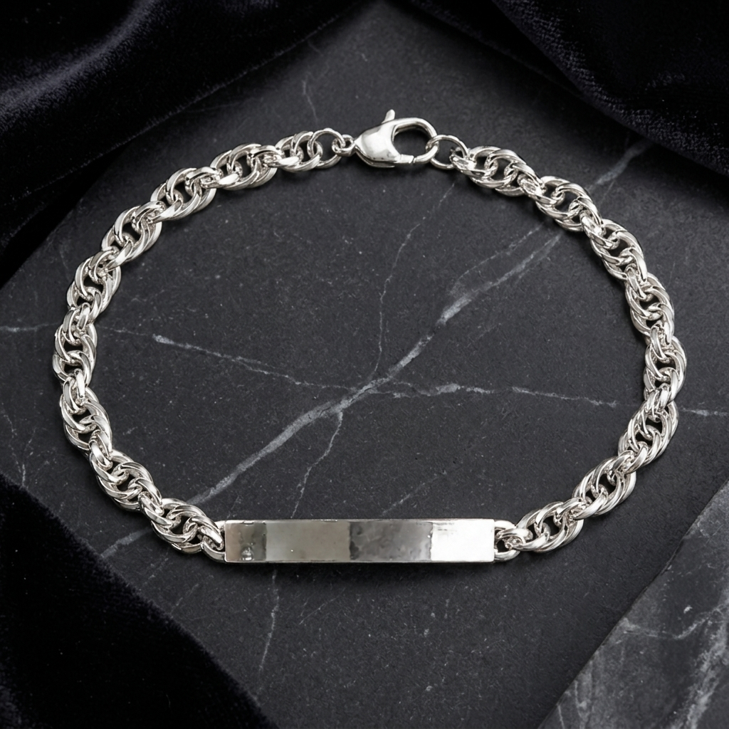The rope chain id bracelet for men shown against a plain studio background
