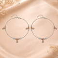 Charm, bead and chain detail on the Silvme rose-gold CZ bell charm 925 silver anklet payal