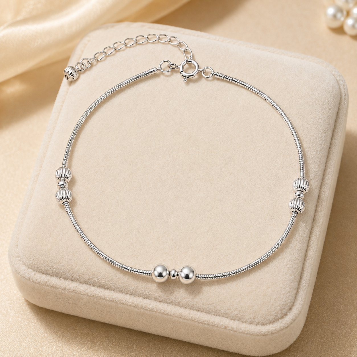 Charm, bead and chain detail on the Silvme silver bead snake chain 925 silver anklet payal