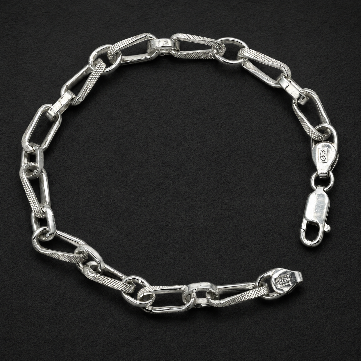Lobster clasp and end links on the Silvme textured paperclip link bracelet