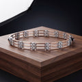 Silvme 925 sterling silver rose gold-tone panel bracelet for men displayed on a wooden block