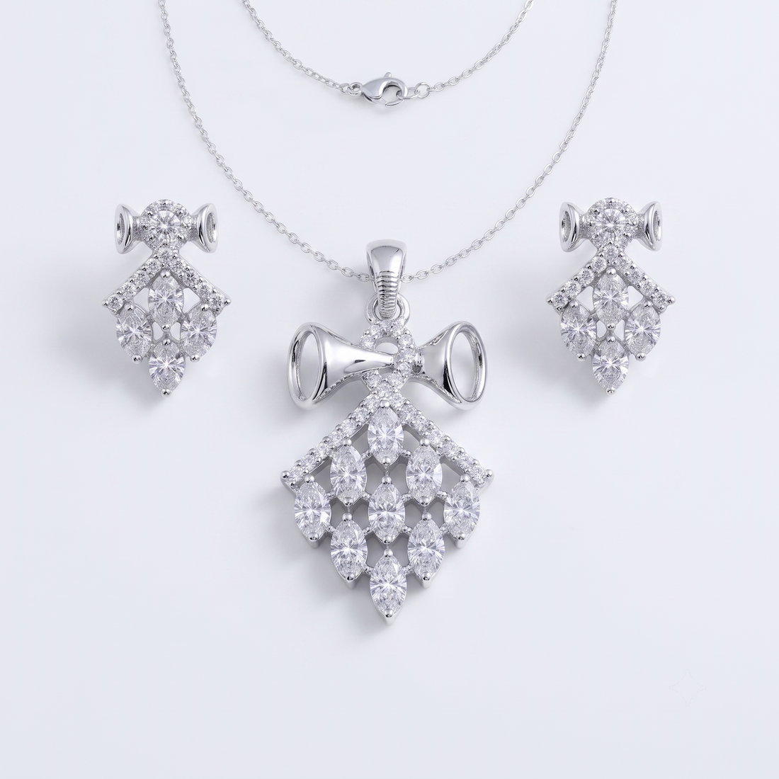 Silvme pure 925 sterling silver kite cluster pendant necklace and drop earrings set with cubic zirconia, styled setting image