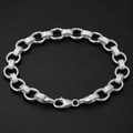 Close-up of round links that switch between a rope-cut texture and a clean polish on the Silvme rope-cut rolo chain bracelet